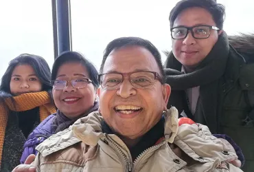 Dr Lisbetty Tampubolon and Dr Rudolf Frans Maulany (centre couple) are UN Volunteer Medical Officers with UNMISS in South Sudan. Here, they pose with their children at a happy reunion.