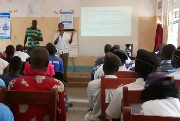 UN Volunteer Child Protection Officer Evelyn Imalingat serves with the United Nations Mission in South Sudan, raising awareness of grave violations committed against children.