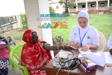 Amalie Boge (right), international UN Volunteer Health Systems Specialist from Norway, serves with the United Nations Population Fund (UNFPA) in Tanzania. 