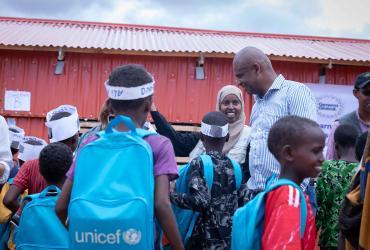 Dr. Abubakar Kampo (in striped shirt) UNICEF Country Representative in Ethiopia during a field visit.