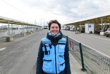 Iryna Koval, national UN Volunteer, during a visit of the inter-cluster coordination group to the Mariinka checkpoint in eastern Ukraine.