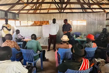 Pictured on the right, wearing a black shirt, UN Volunteer Civil Affairs Officer with UNMISS, Morris Charumbira, during a training session on reconciliation and trauma healing in Leer County, Unity State.