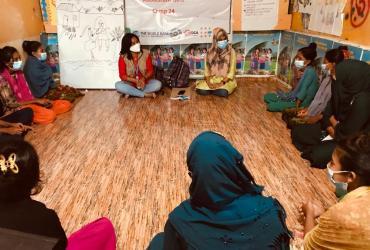 Urmi Tanchangya (third from left) is a national UN Volunteer Programme Assistant with UNFPA in Bangladesh. Here, she discusses with adolescents and youth during a session on the life skills education approach dubbed Girl Shine Programme. 