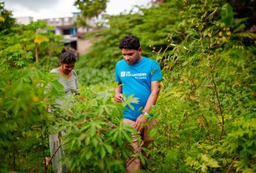 Community volunteers create positive change and build resilience through people-to-people connections. Here, UN Community Volunteer, Mohamed Siraj (right) with UNDP Sri Lanka visits a beneficiary of a food security and home gardening project in Colombo.