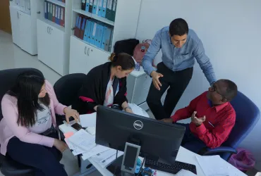 UN Volunteer Ghazi Mabrouk with colleagues at UNDP Libya office
