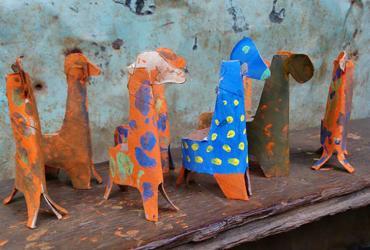 Paper giraffes made by children.