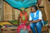 SIDJUI Emma Brigitte, Community-Based Protection Assistant and BOUKOKOU Tatiana, Registration Assistant Djohong (left), UN Volunteers with UNHCR, visit refugee Salamatou HAMAN at her home in Bertoua, Cameroon. 