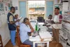 Alec Mkwamba (far right), UN Volunteer Epidemiologist and Project Manager with UNDP, interacts with colleagues in São Tomé and Príncipe.