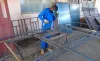 Felix Celestino is learning civil construction metal working through an apprenticeship made possible by the UNDP-supported Saber Fazer project. 