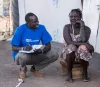 One of the Refugee Volunteers, Ojala, conducting a community survey in the Kakuma refugee camp in Kenya. 