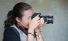 Alana Foley Pradhan, UN Volunteer Knowledge Management Officer captures photos, interviews, and dialogues in an interagency mission with UN Women in Liberia.