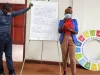 Mercy Melody Kayodi, Joven Voluntaria de las Naciones Unidas nacional, durante un debate sobre el papel de la sociedad civil en el tratamiento de la seguridad alimentaria y sus efectos, en la Asociación de las Naciones Unidas de Uganda.