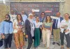La Voluntaria de las Naciones Unidas Rewa Barghouthy (segunda por la izquierda, primera fila) durante el lanzamiento del Grupo Consultivo de Jóvenes en Belén, Estado de Palestina.