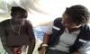 UN Volunteer Midwife Grace Kerkulah Temeh (Liberia) with a patient.