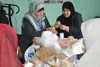 Shahd El-Swerki (left), national UN Volunteer Communications Assistant at UNDP Gaza, visited a cancer care centre and joined women volunteers in sewing breast prosthetics, which are distributed for free to female cancer patients.