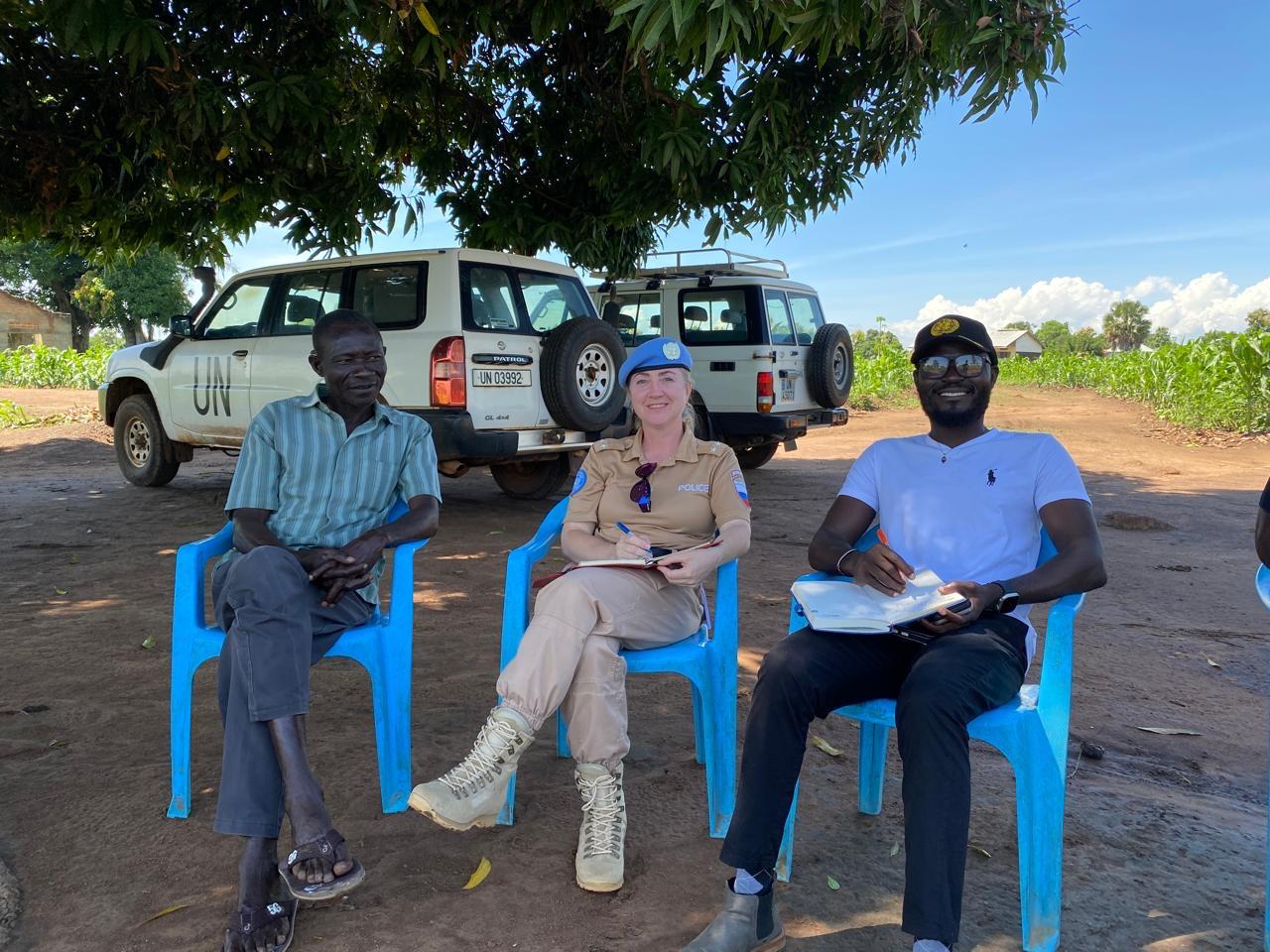 During monitoring visit to Kondeko Police Post, Yei River County. South Sudan police officer by the left, UNPOL officer in the middle and human rights officer by the right