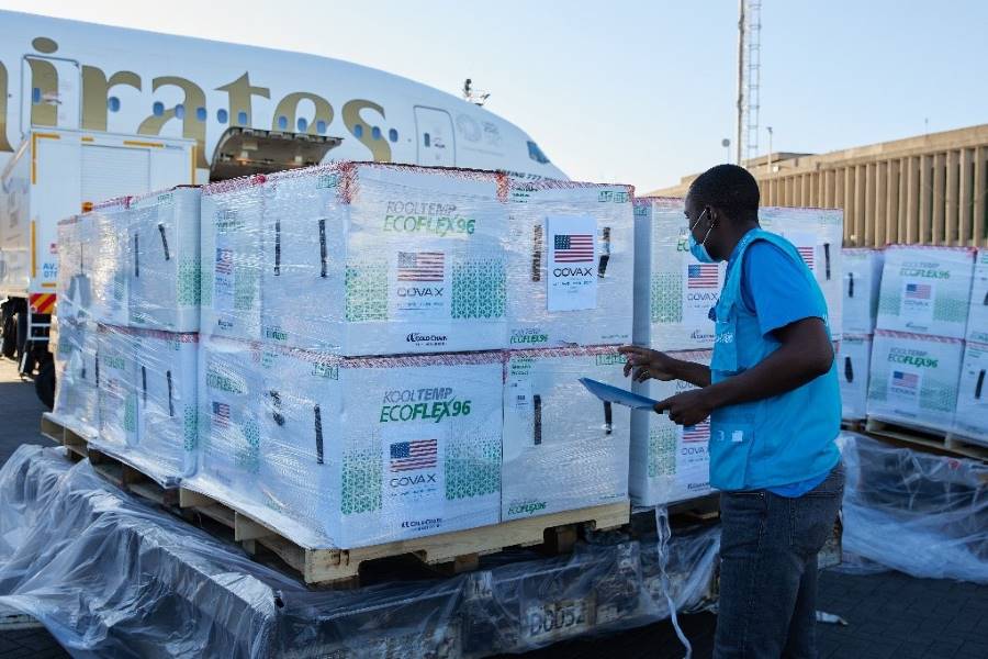 Lucas Odhiambo inspects the arrival of 880,000 Moderna COVID-19 vaccines donated by the United States government.