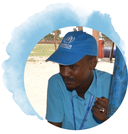 UN Volunteer with a blue cap